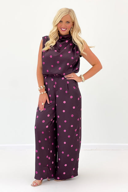 Plum polka dot top with a cowl mock neckline