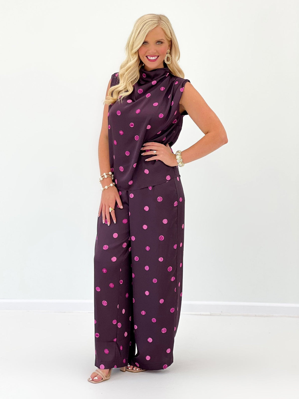 Plum polka dot blouse with a soft mock collar