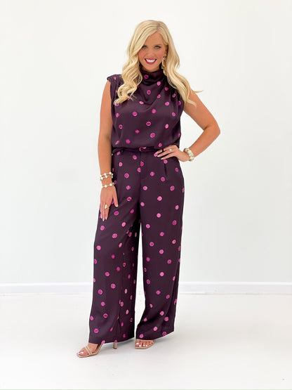 Dotted plum top with a draped cowl neck