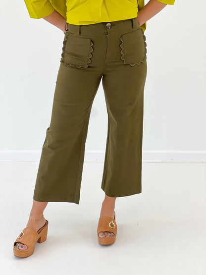 Cropped wide leg pants with a scalloped hem