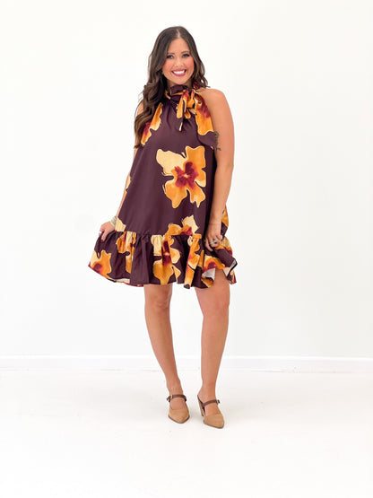 Floral print mini dress in brick with a neck tie