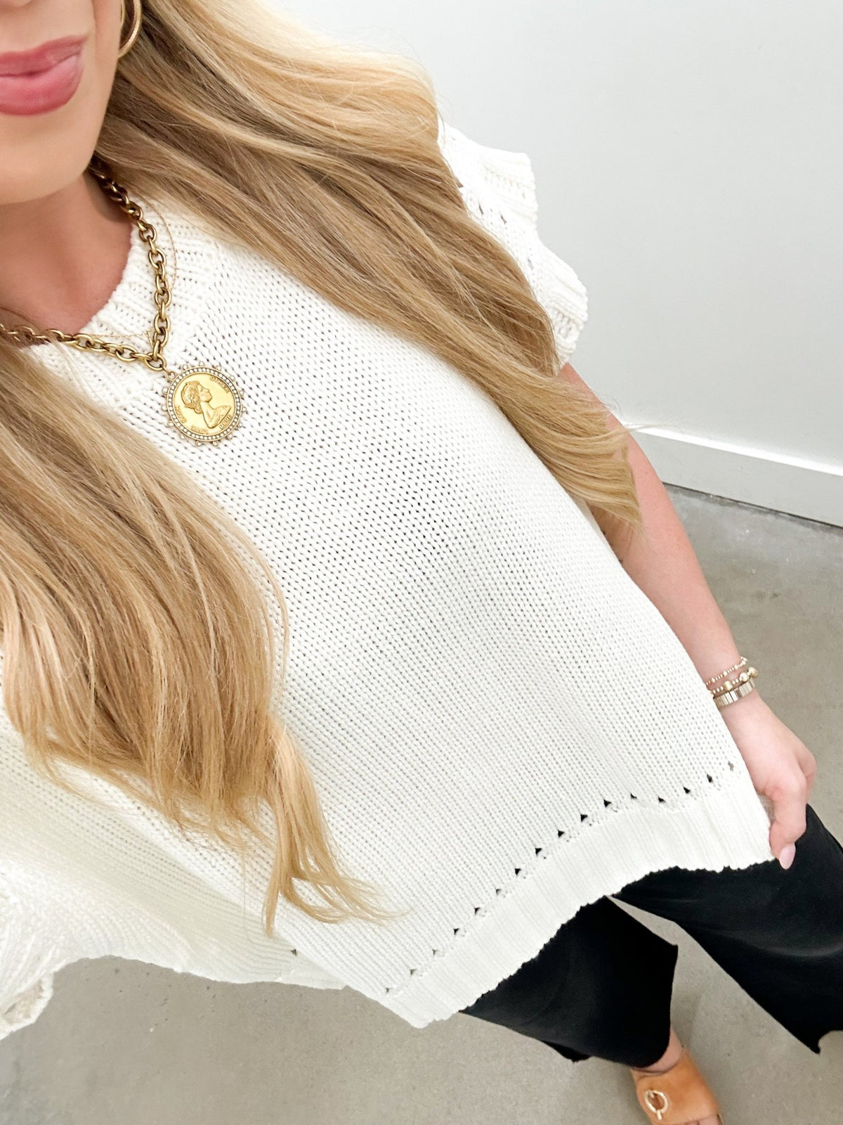 Short sleeve sweater top with a classic crew neck