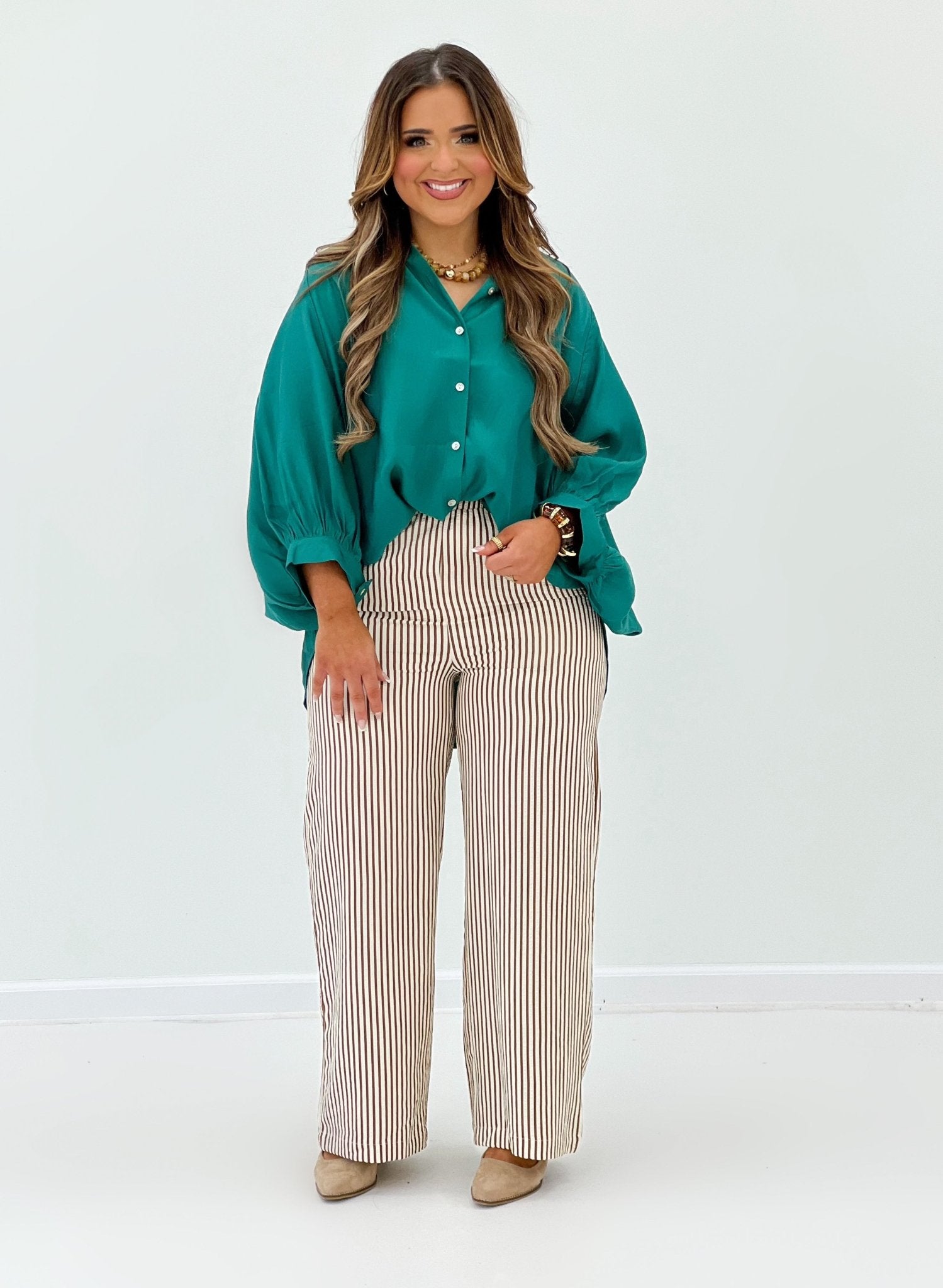Long sleeve button up blouse with a straight fit