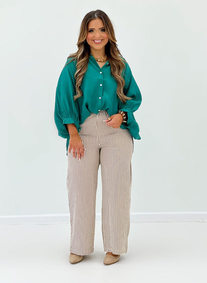 Long sleeve button up blouse with a straight fit