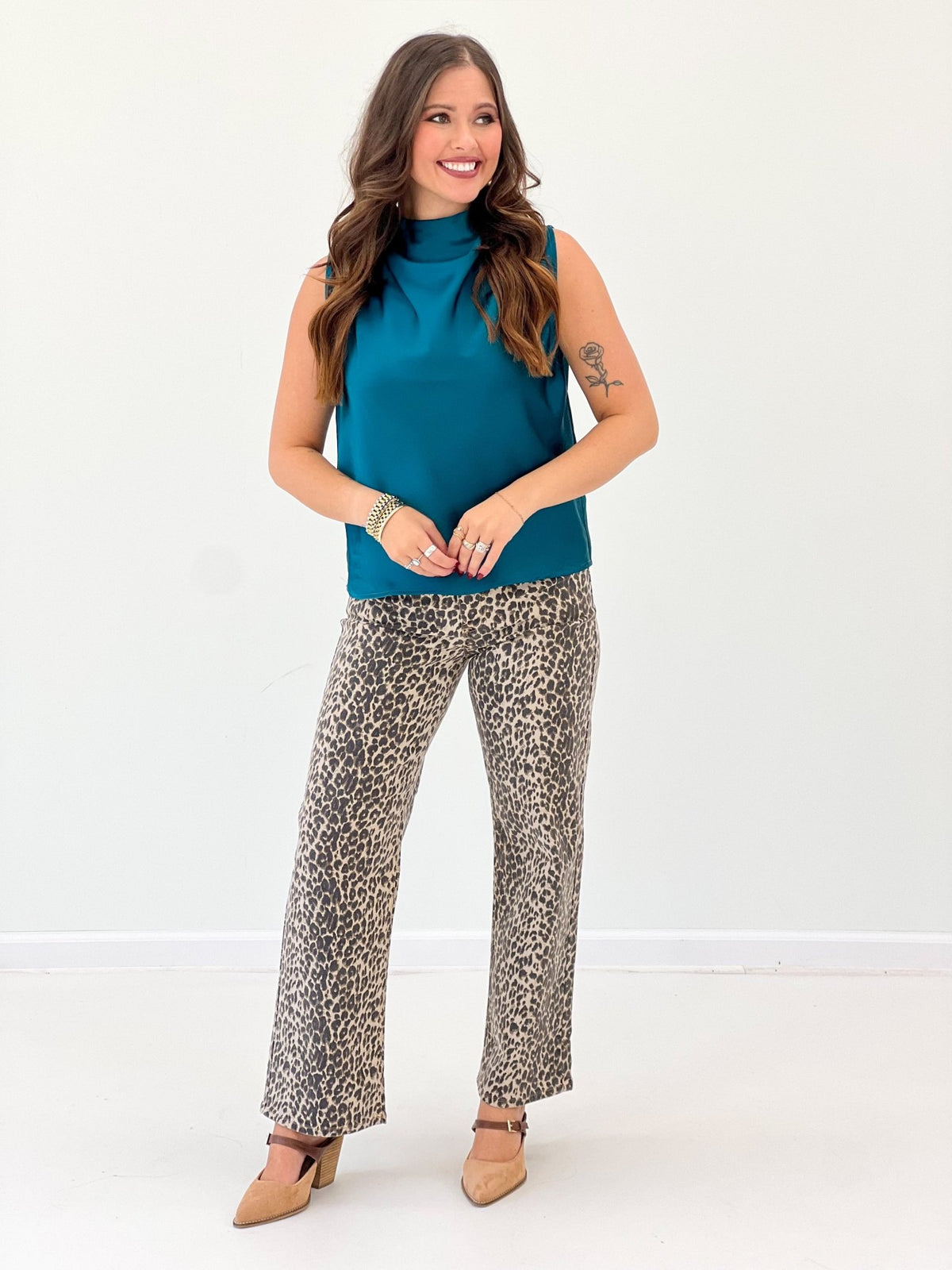 Sleeveless mock neck top with a fitted body