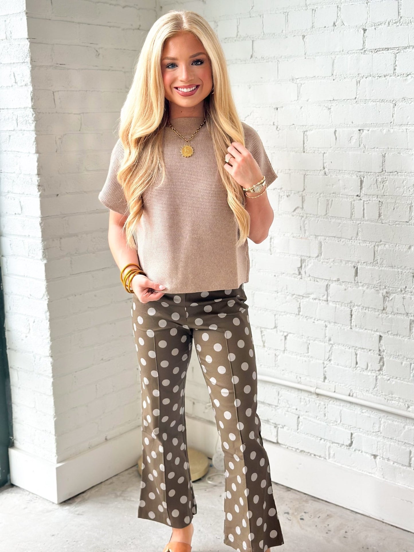 Cropped flare pants in a small polka dot print