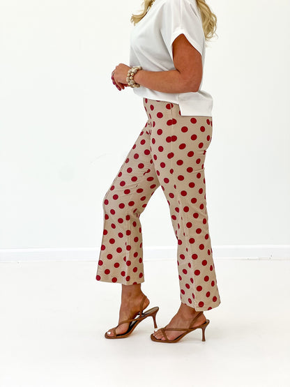 Polka dot print pants with a cropped flare silhouette