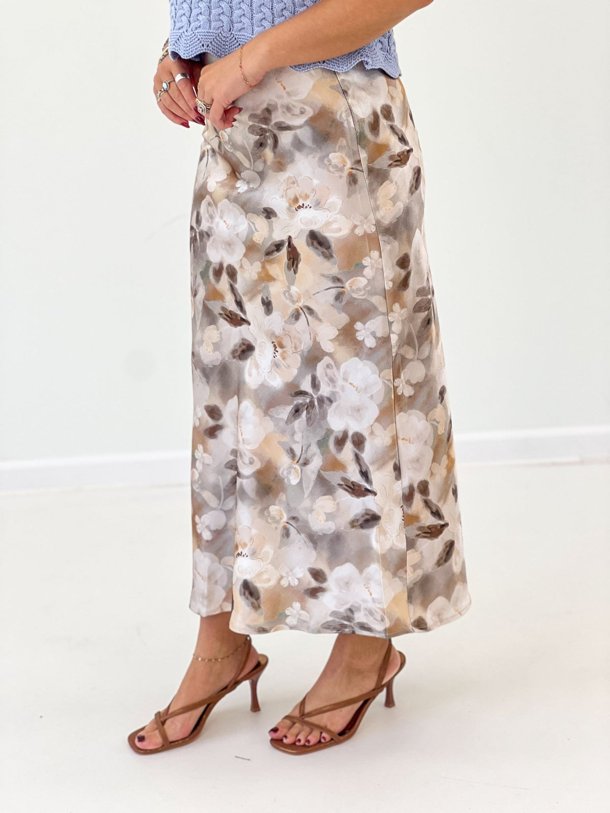 Printed taupe midi skirt with a soft flowing hem