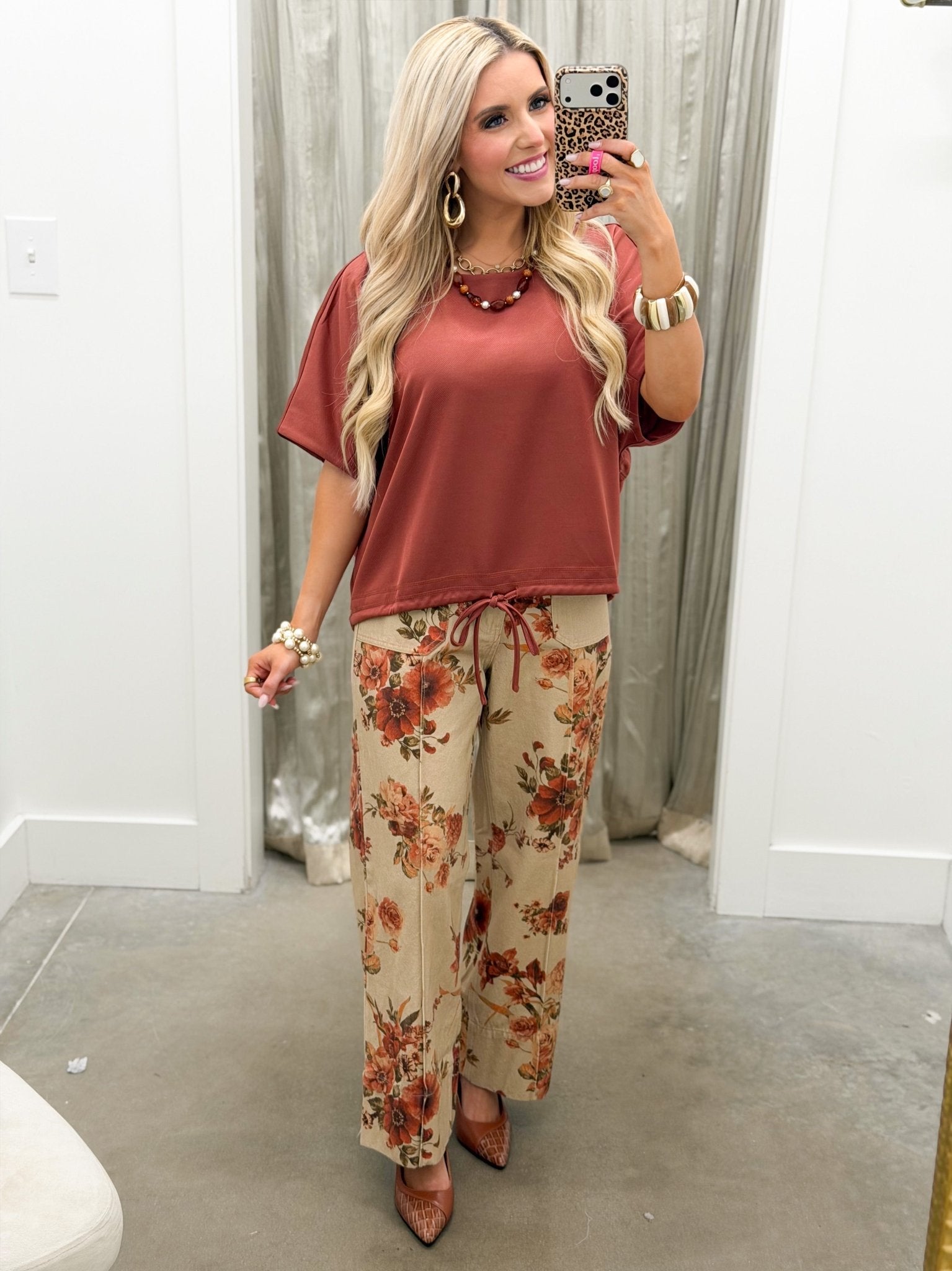 Short sleeve top with a gathered tie waist