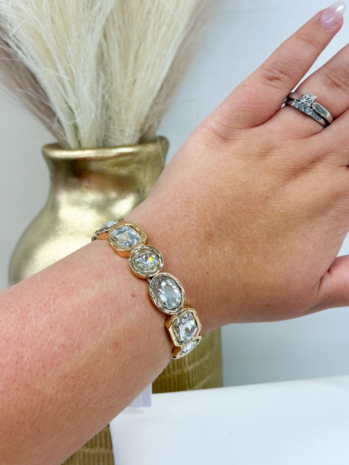 Clear glass bead bracelet with gold-tone accents