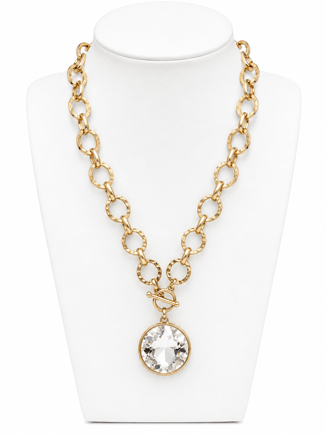 Round glass pendant on a gold chain necklace
