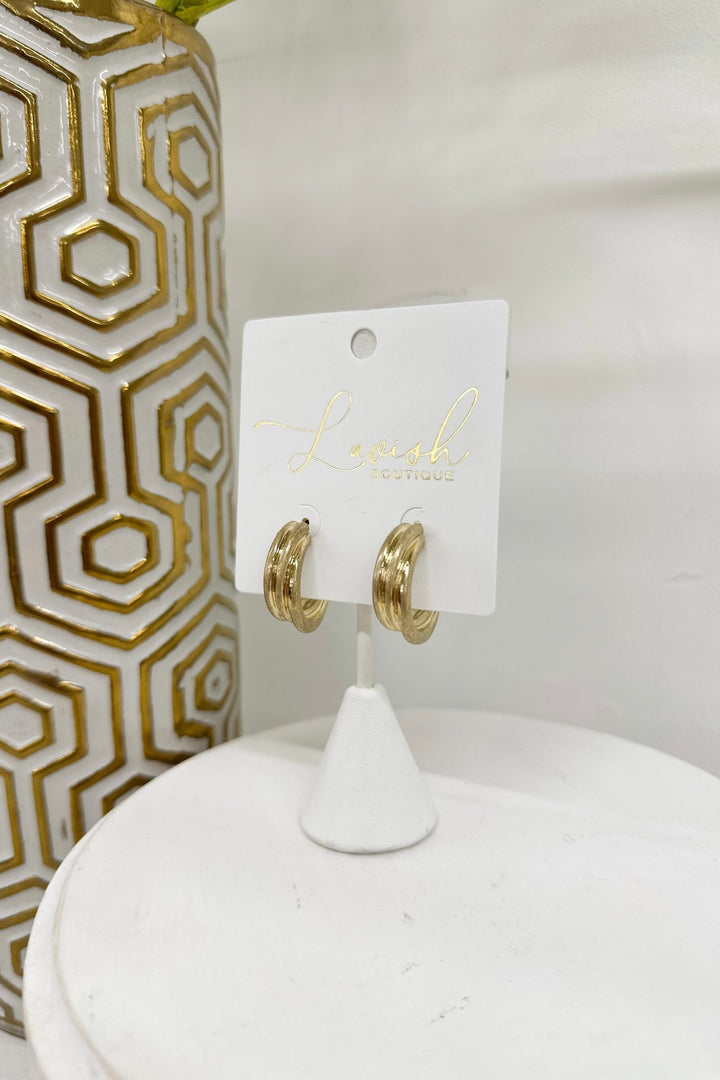 Gold 10mm textured metal hoop earrings