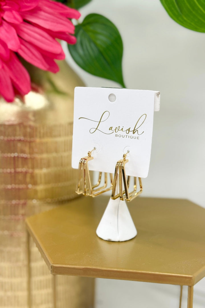 Gold square hoop earrings in three layers