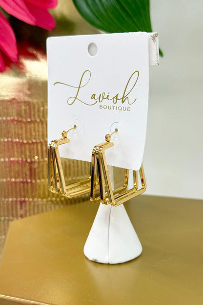 Layered gold hoops with an angular square shape