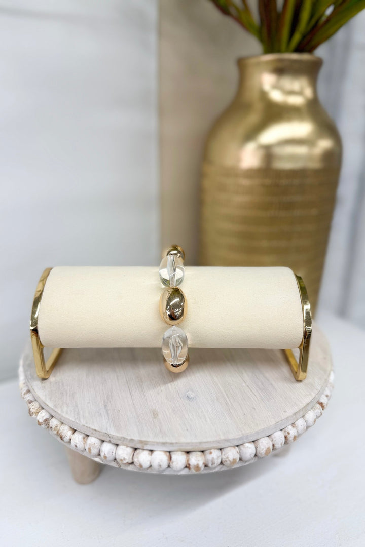 Gold bracelet with clear ice-toned beads