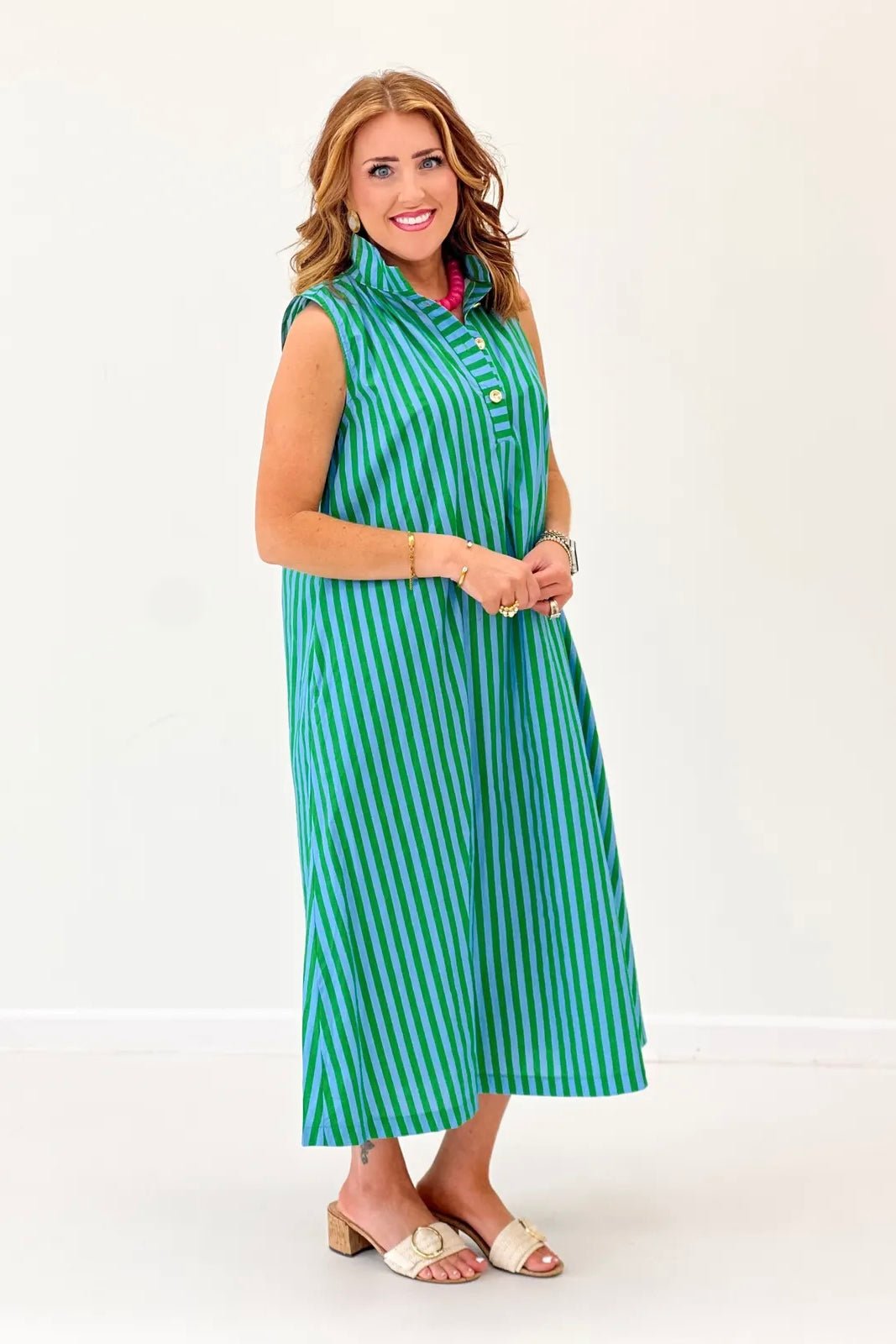 Striped midi dress with a polished gold button trim