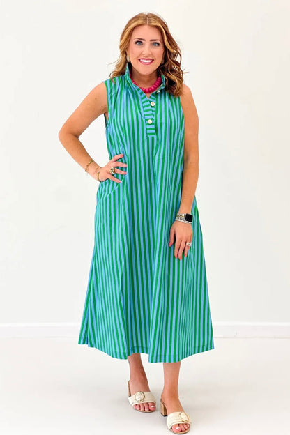 Gold buttons down the front of a striped cotton midi dress