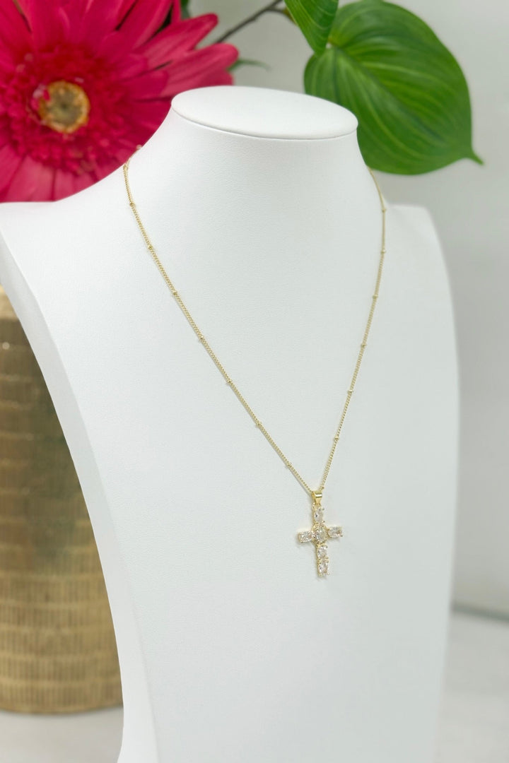 Gold cross pendant necklace