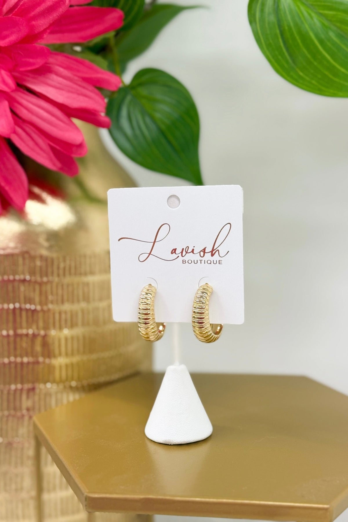 Smooth gold U hoops with a wide profile