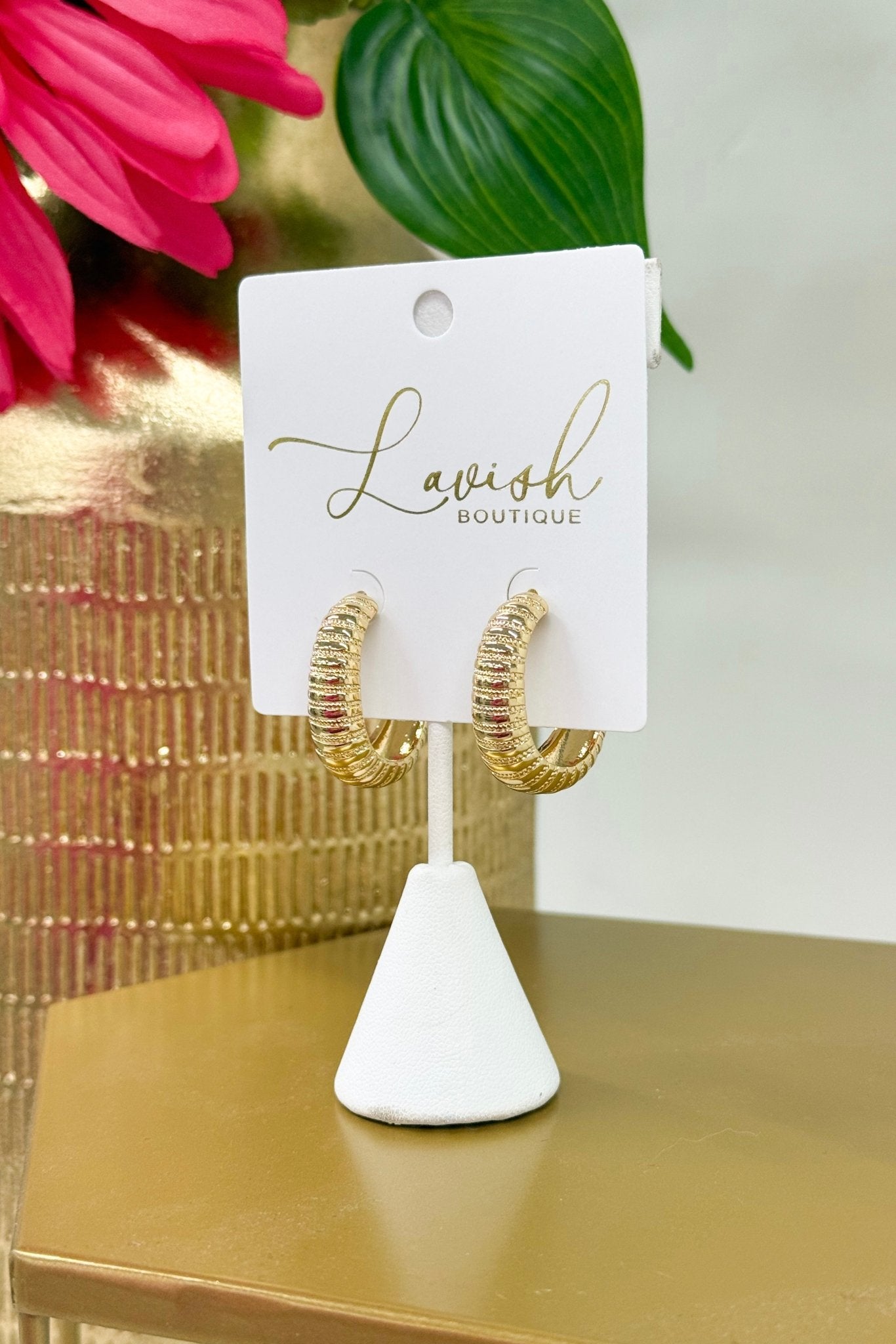 Gold U-shaped omega hoop earrings