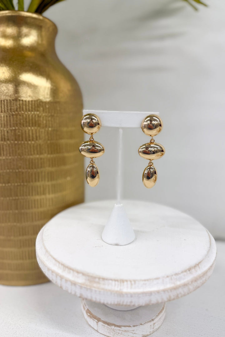 Gold oval and round drop earrings