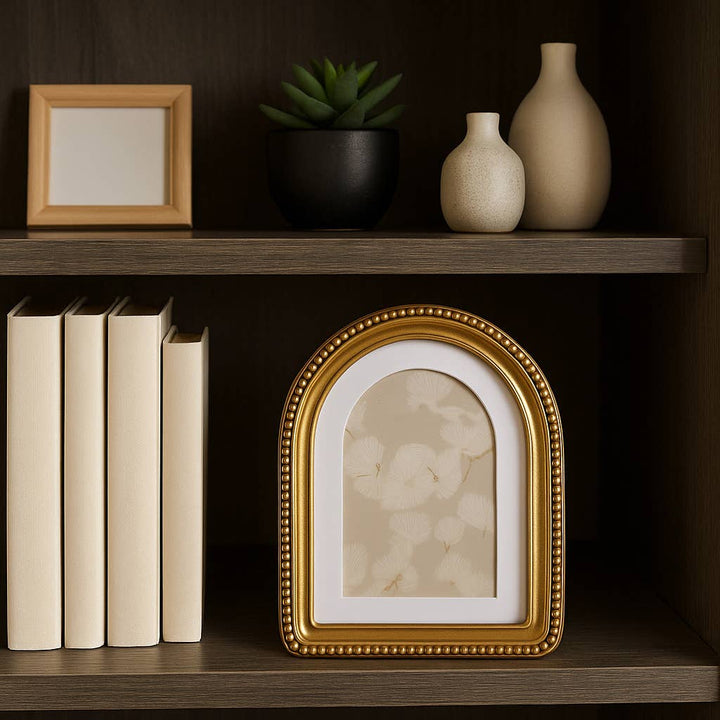Gold 4x6 picture frame with a beaded arch design and matted opening