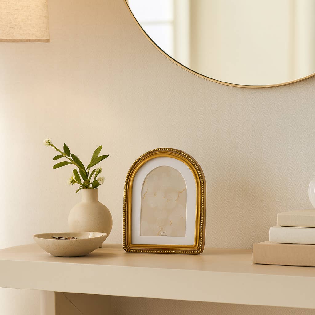 Beaded gold arch frame with a matted 4x6 opening