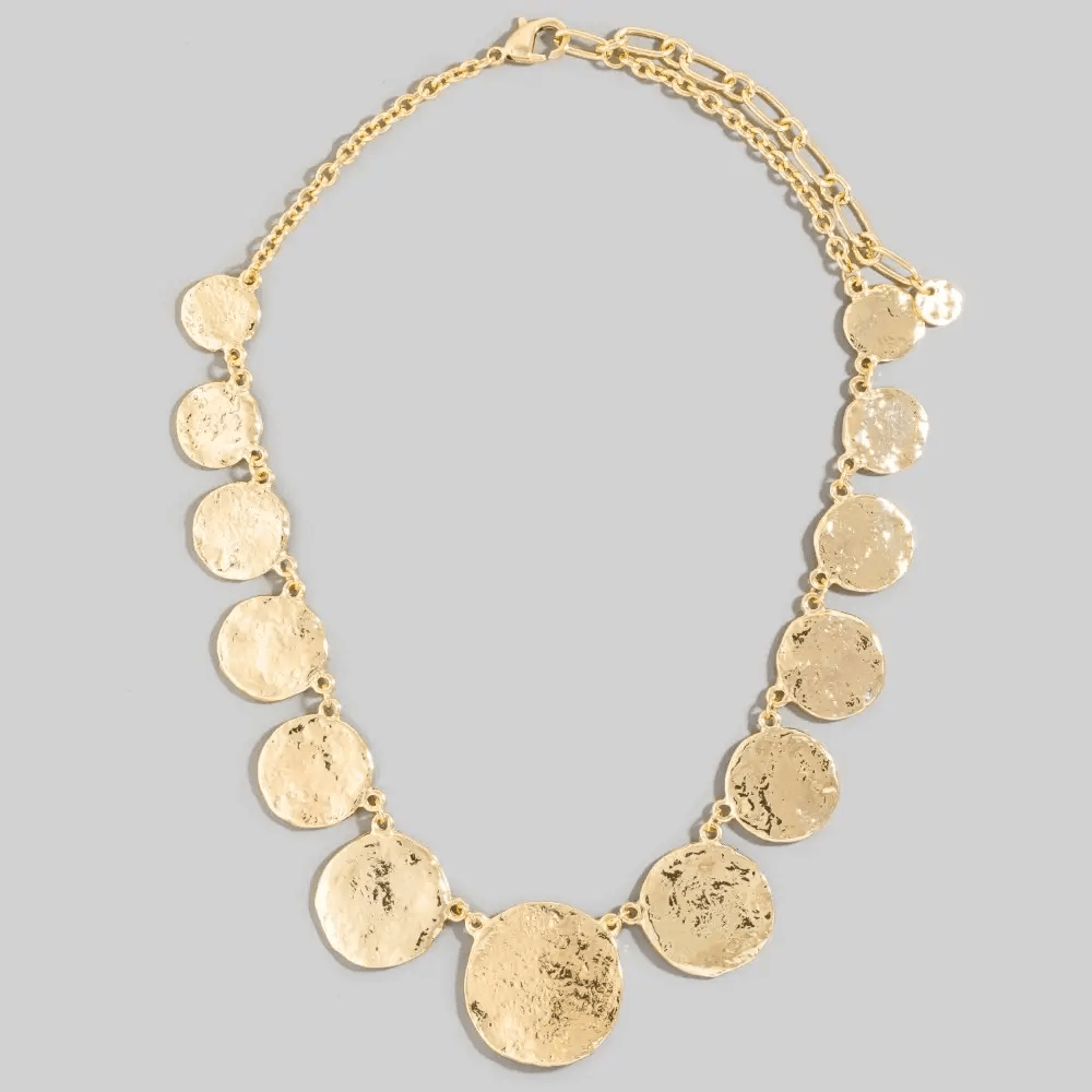 Coin necklace with a hammered textured surface