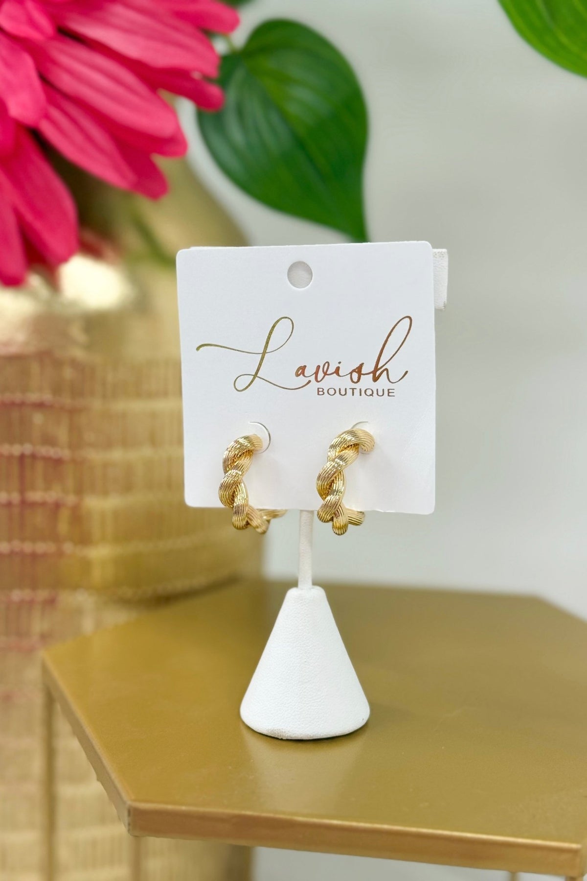 Gold textured and twisted open hoop earrings