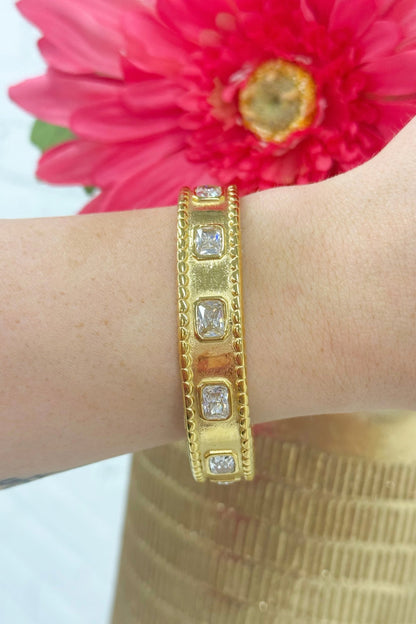 Timeless gold bangle with pave stones