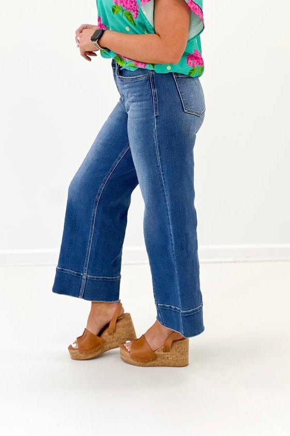 Ankle length wide leg trousers with a high waist