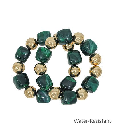 Double-row bead bracelet with gold-tone spacers