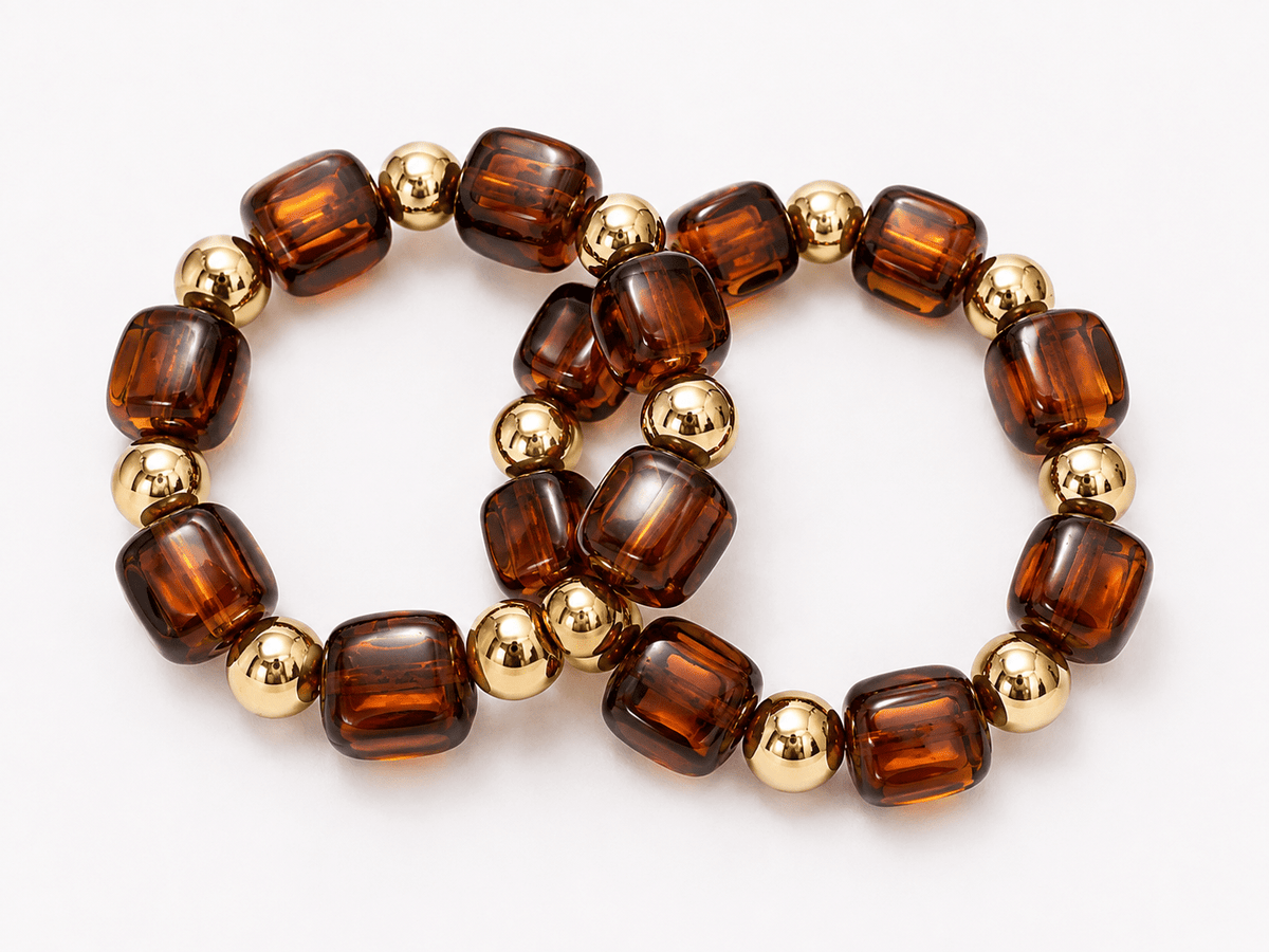 Two-row bracelet of square beads and metal accents