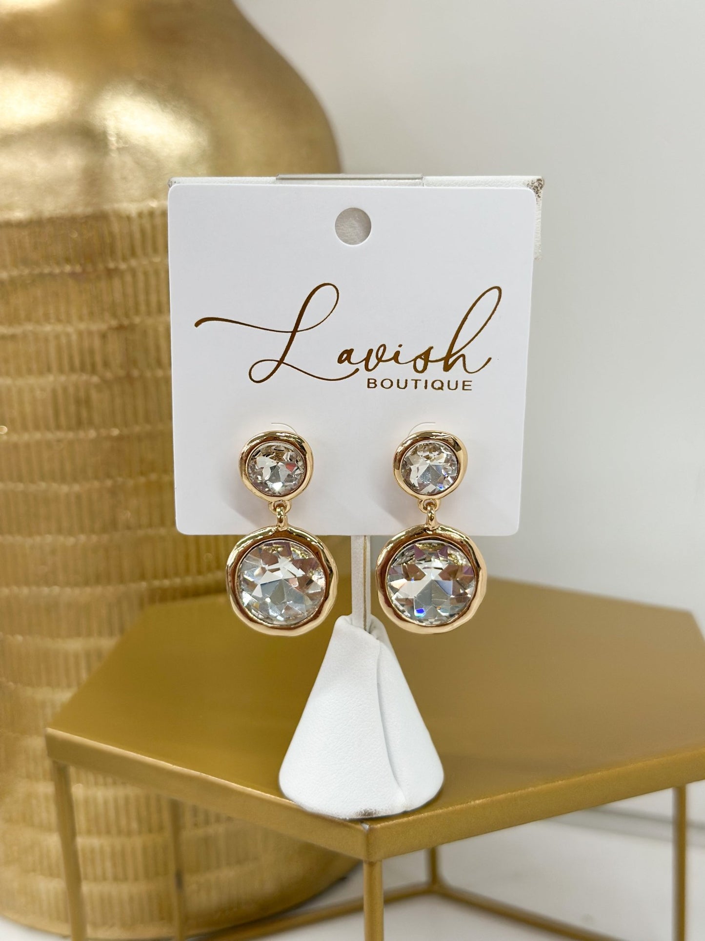 Framed pearl earrings with a two-tier drop