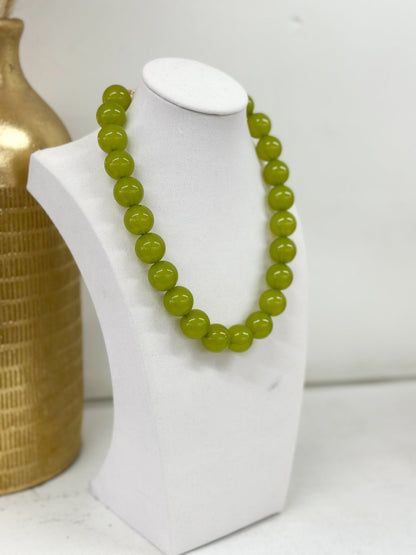 Colored ball necklace with evenly spaced beads