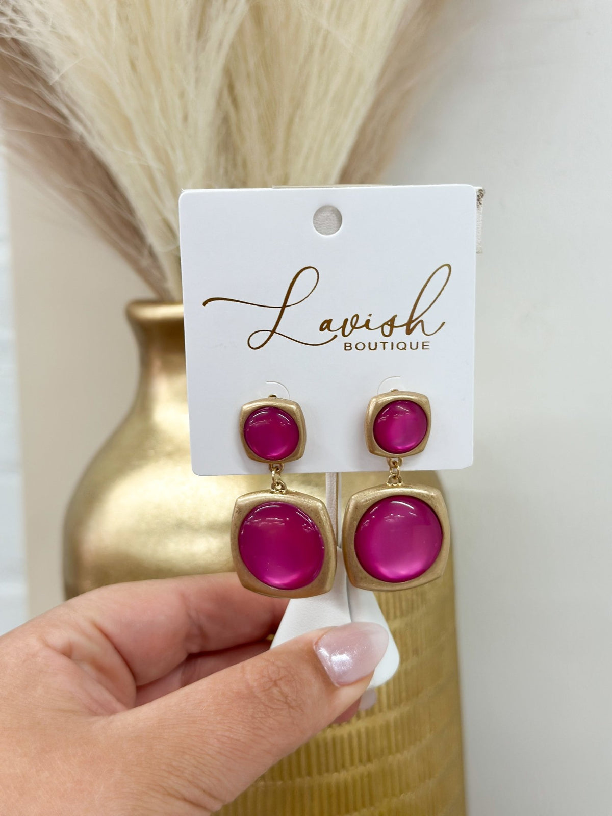 Hot pink stone earrings with gold-tone metal