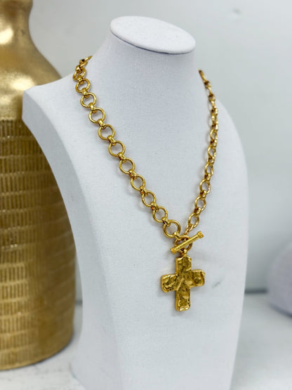 Cross charm necklace with cream bead accents