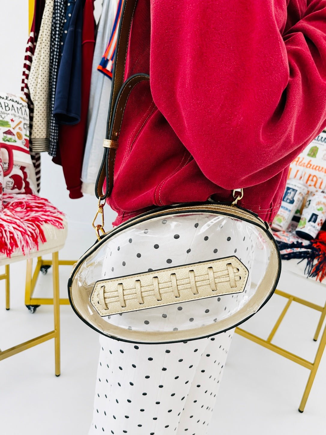 Clear football-themed crossbody bag with gold-tone hardware