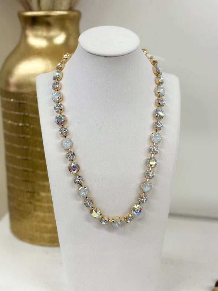 Clear glass stone necklace with a gold magnetic clasp