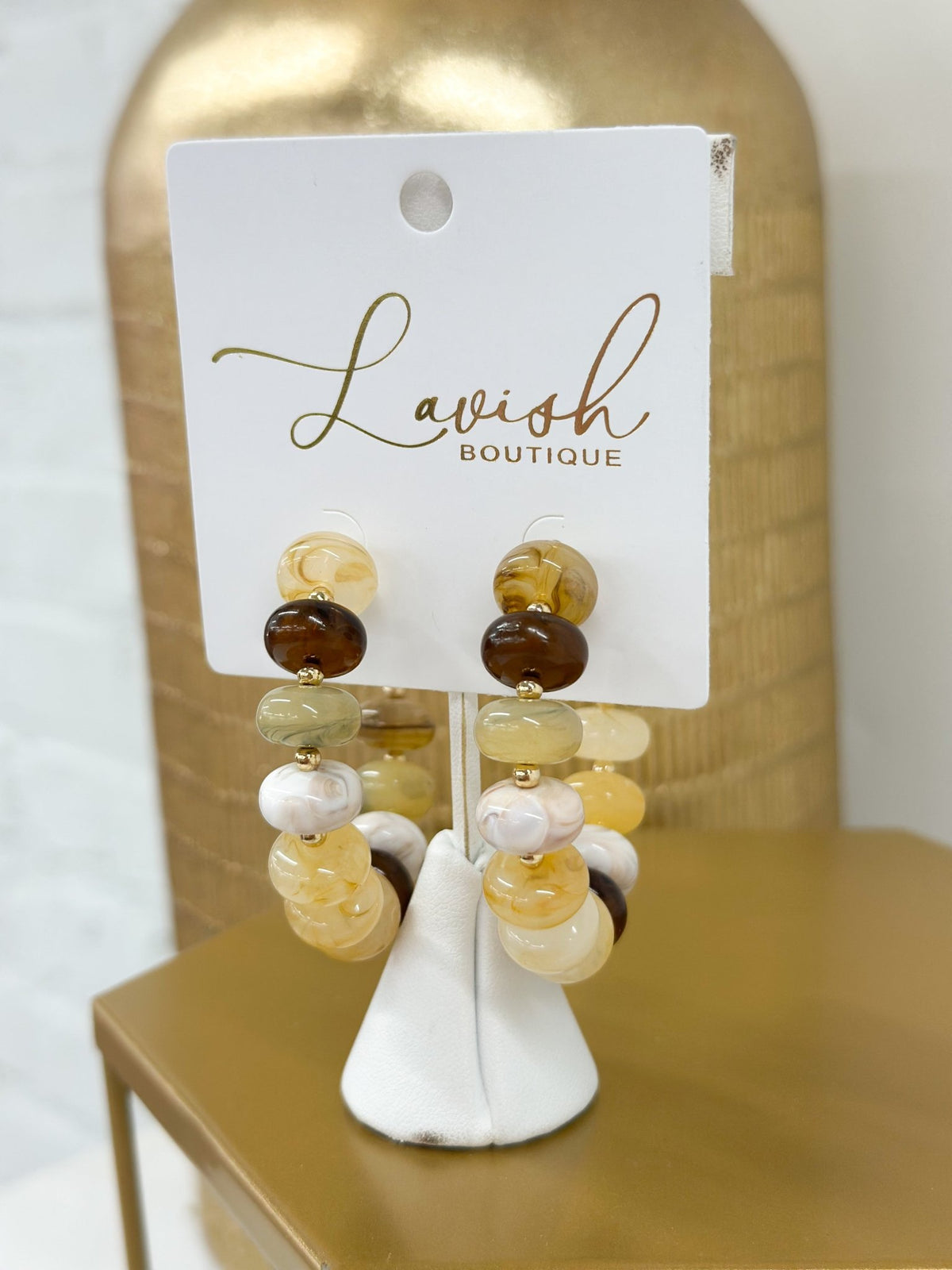 Hoop earrings lined with round marble beads