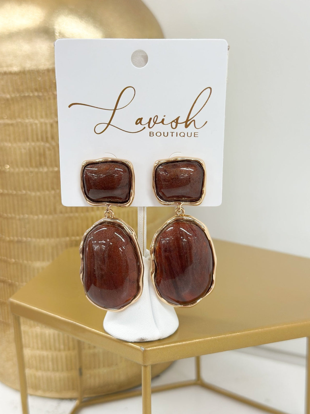 Gold-tone earrings set with veined marble stones