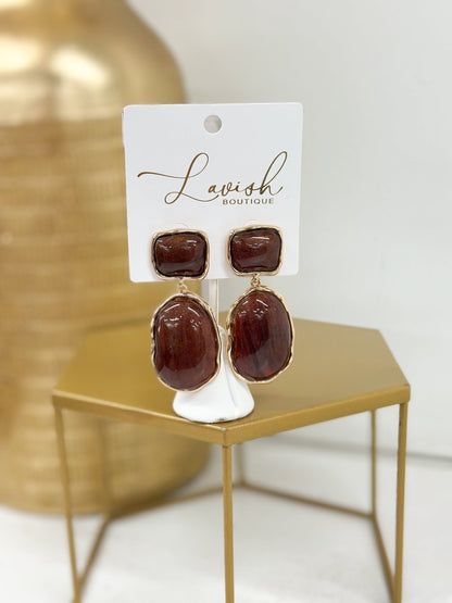 Marble earrings pairing rounded and angular shapes