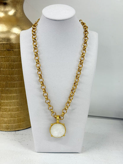 Necklace with a single round stone pendant