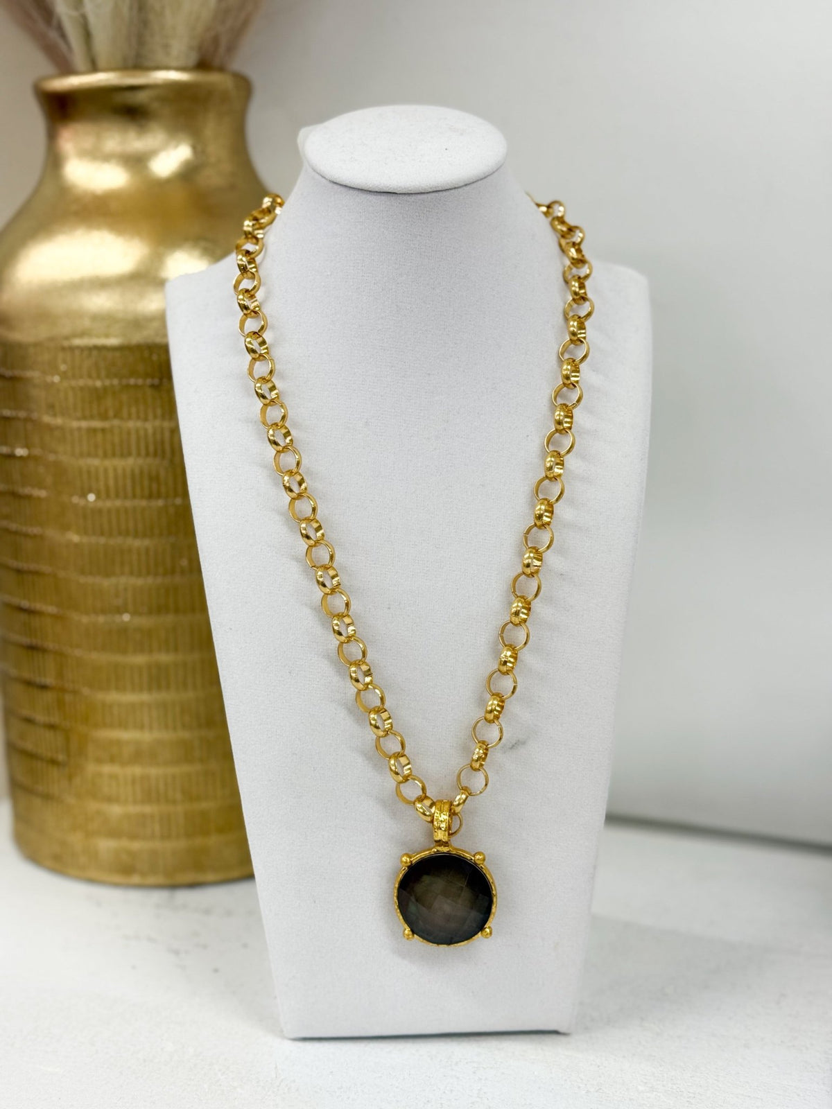 Round pendant necklace with a smooth polished stone