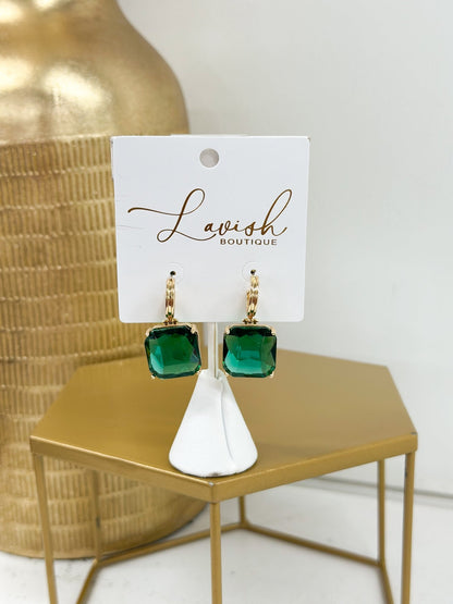 Faceted square stones dropping from gold-tone posts