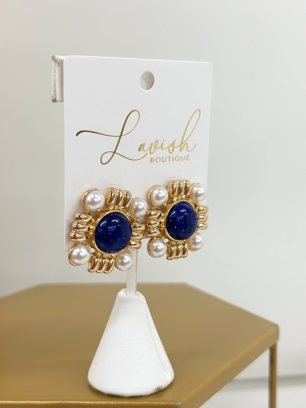 Colored stone earrings finished with a round pearl