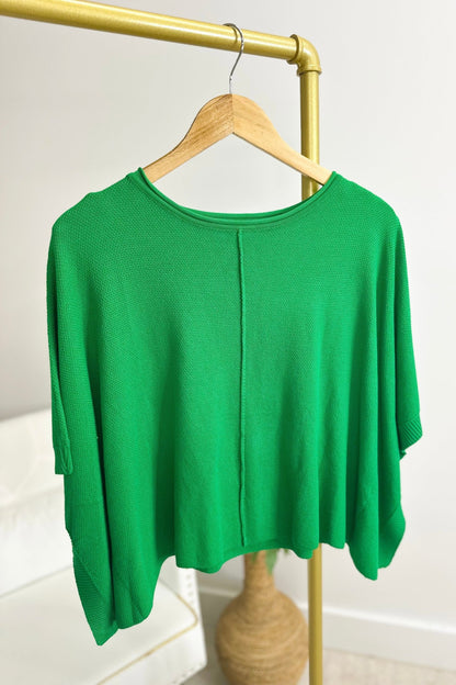 Green batwing top with a relaxed drape