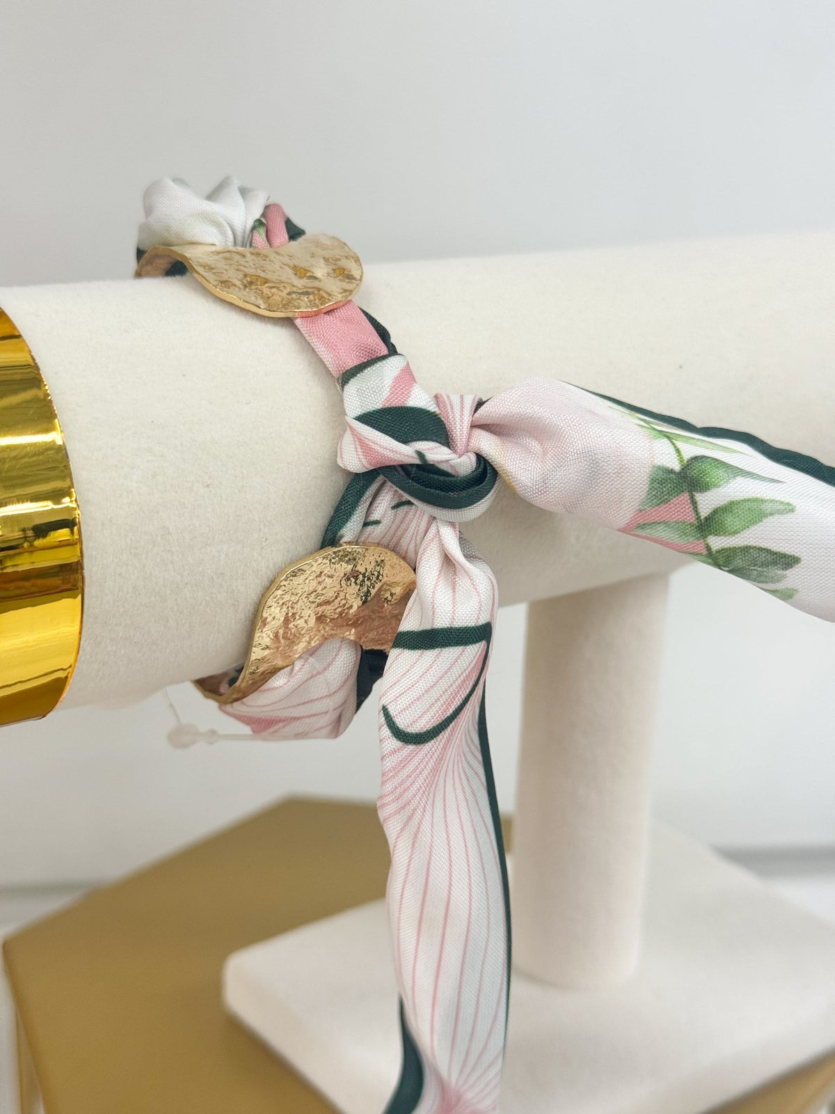 Scarf bracelet with a hammered metal centerpiece