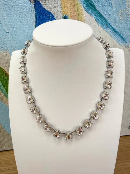 Cut gemstone beads strung into a necklace
