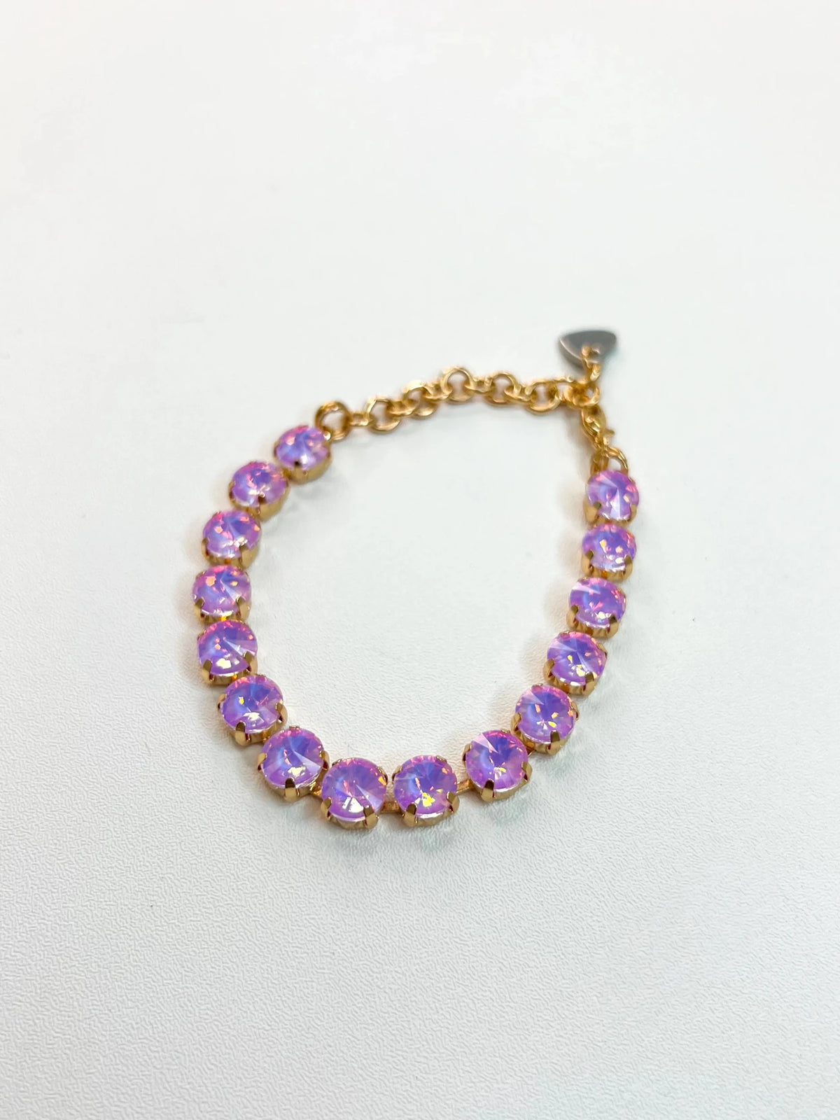 Iridescent stone tennis bracelet in a single row